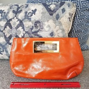 Michael Kors orange clutch